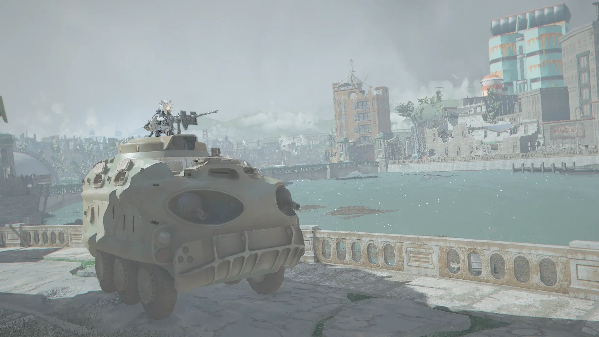 写真: 川沿いに進むAPC