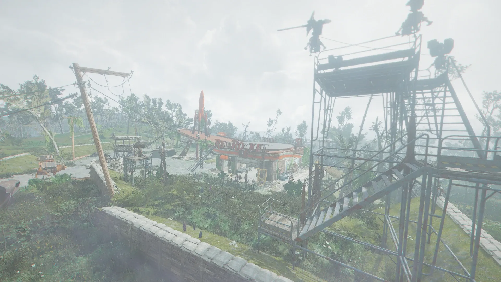 写真: サンクチュアリ近郊にあるレッドロケットを元にした拠点。土嚢といった囲いも設け、より襲撃に耐えうる拠点に